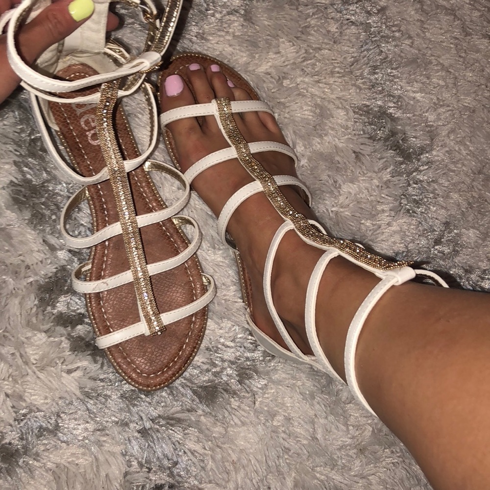 White and gold strappy flats